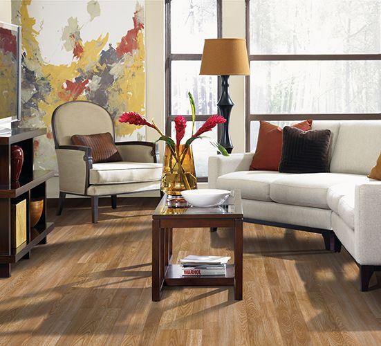Warm laminate floors in a trendy mid-century modern living room